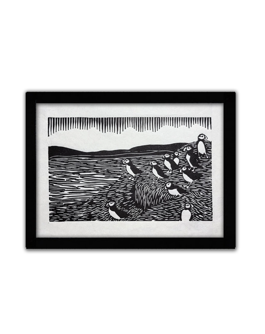 a linoprint of a flock of puffins standing on a cliff's edge looking towards the ocean