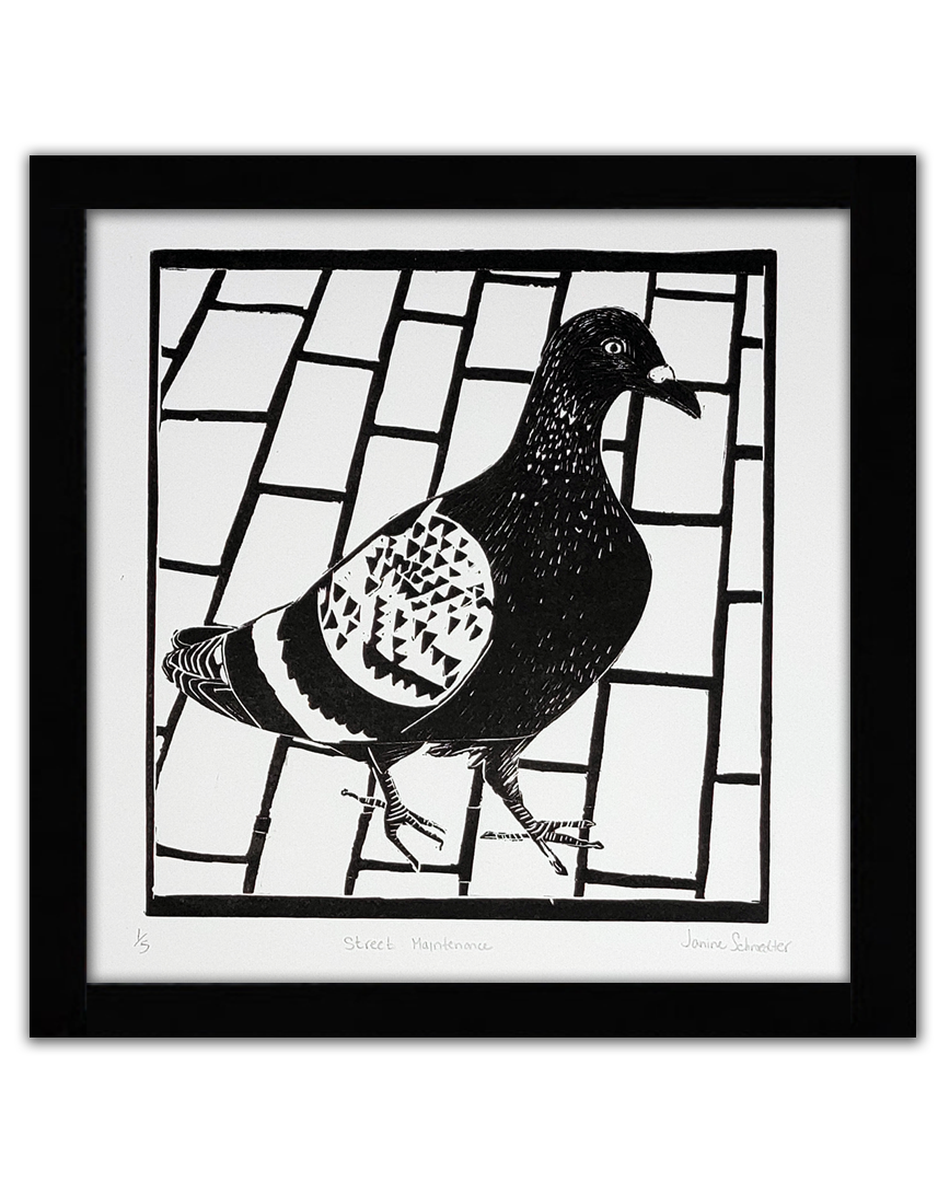 A black linocut of a pigeon on a brick road