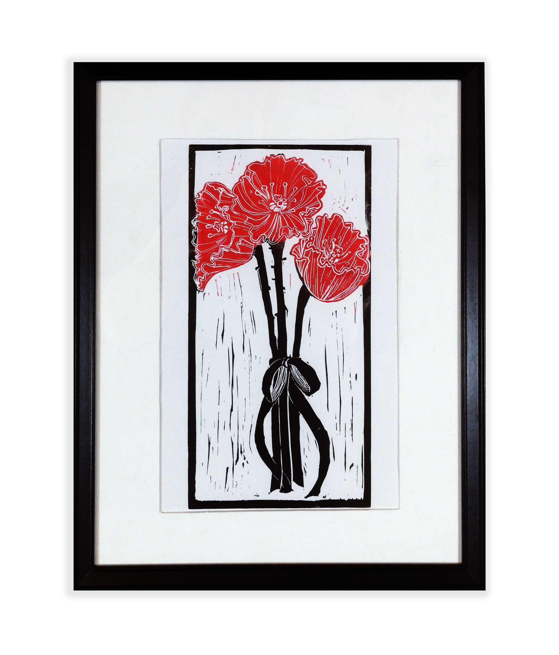 A linocut of red poppies with long black stems tied in a black ribbon